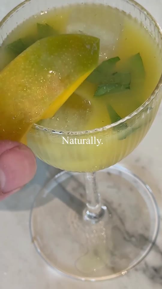 Mango Peach Champagne Cocktail
